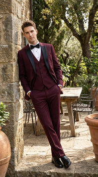 Men’s Burgundy Vested Wedding Tuxedo, One Button Jacket with Black Peak Lapel and Matching Pants
