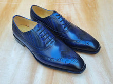 Carrucci Wingtip Slip-on Oxford