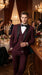 Men’s Burgundy Vested Wedding Tuxedo, One Button Jacket with Black Peak Lapel and Matching Pants